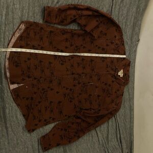 Brown woolrich nature flannel size large with pocket on the chest